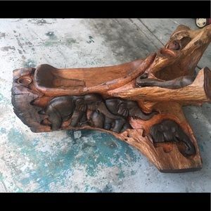 This vintage hand carved wooden tree stump bench